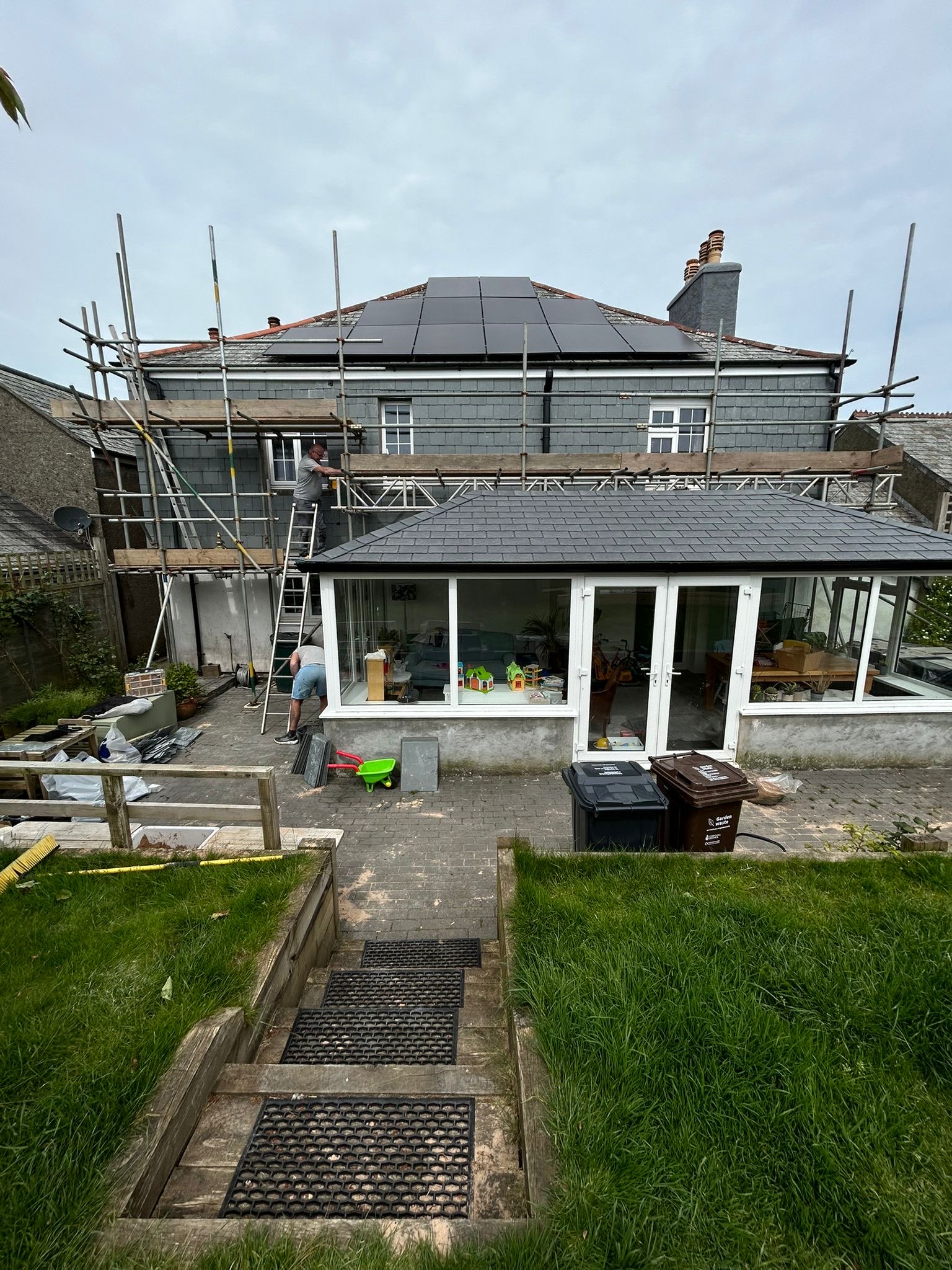 Scaffolded roof and slate work by NAC Roofing